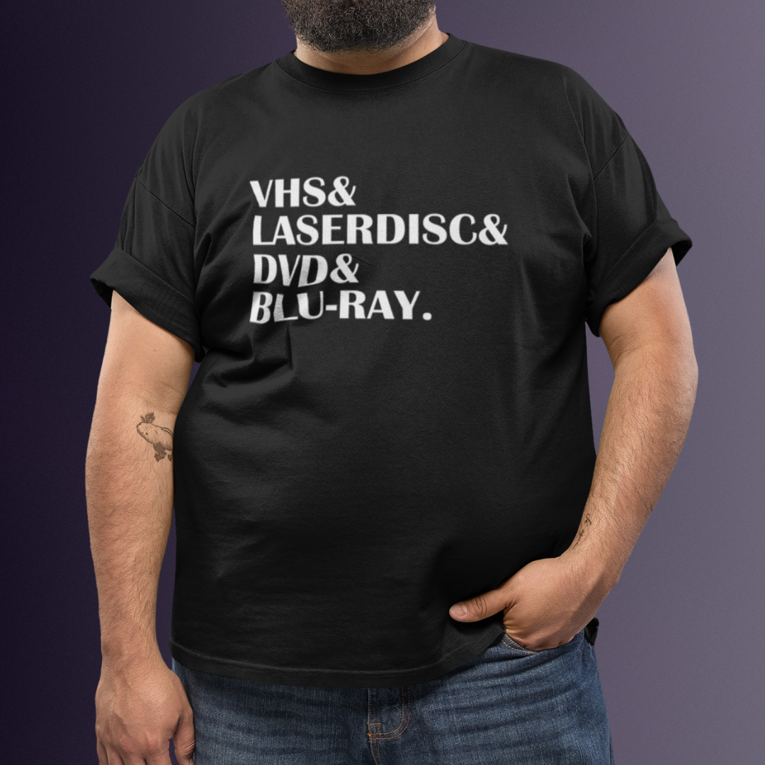 T-SHIRT PLUS SIZE VHS DVD LASERDISC BLURAY (Estampa Branca)