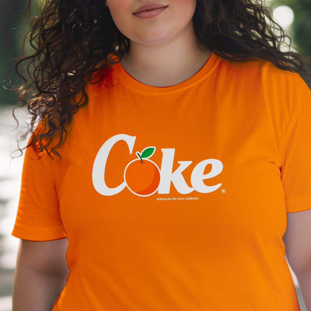 Nome do produto: Camiseta Coca Laranja